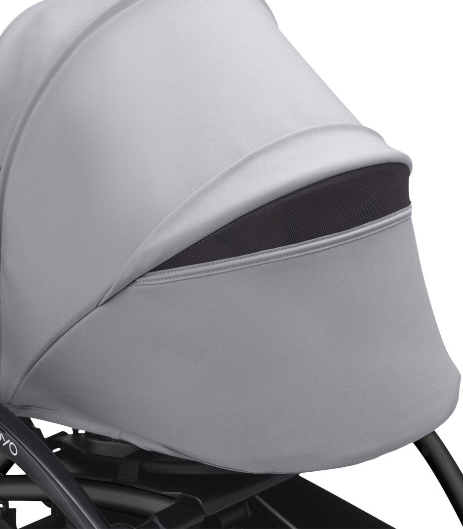 Stokke® YOYO3® 0+ Stone. Black Frame. Canopy ventilation open. Close-up. Angled. galery image 5